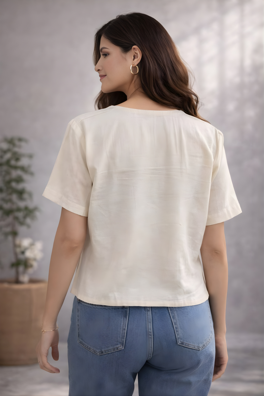 Lightweight ivory summer top with delicate floral details