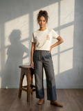 Beige women’s T-shirt featuring “In My Era” embellished text detail