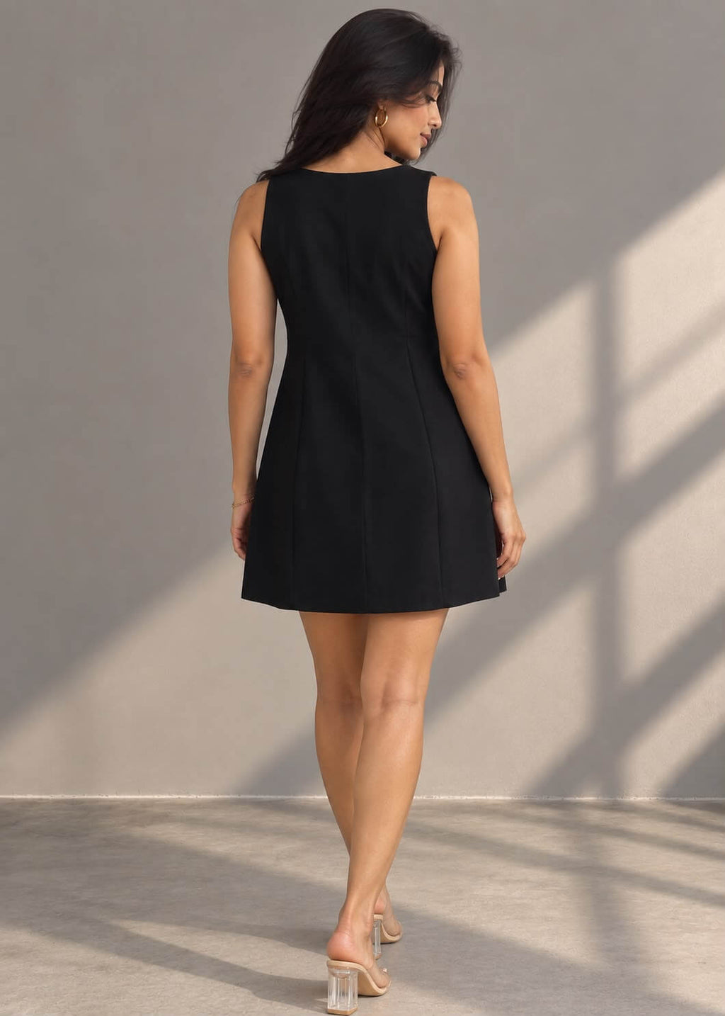 Black birthday mini dress with floral embellished hem