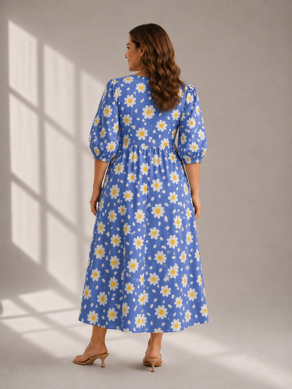 Side pose of blue floral cotton puff sleeve midi dress for women