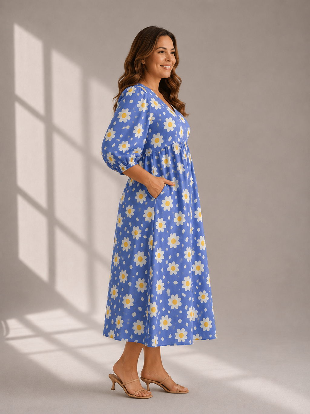  view of blue daisy print cotton midi dress with puff sleeves