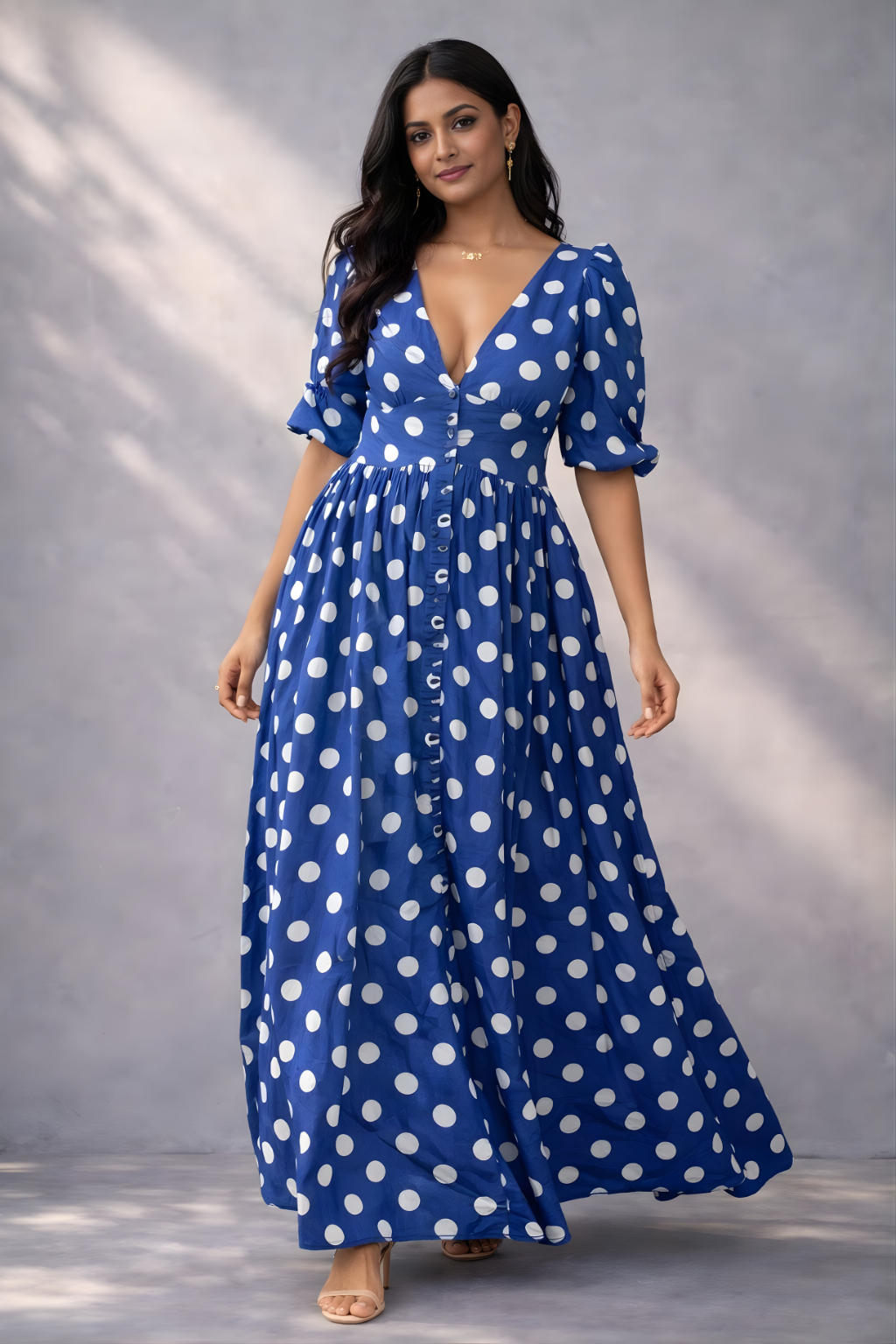 Blue polka dot maxi dress with V-neck and puff sleeves 