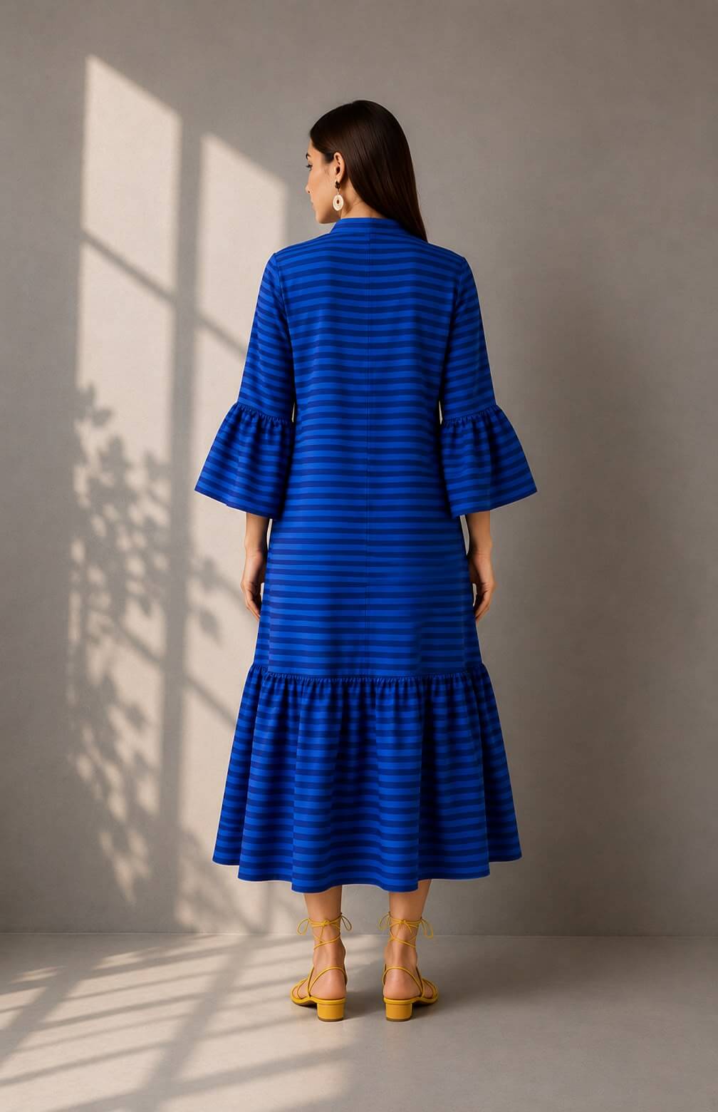 Relaxed fit cobalt blue dress for women with a flowing silhouette and contemporary design.