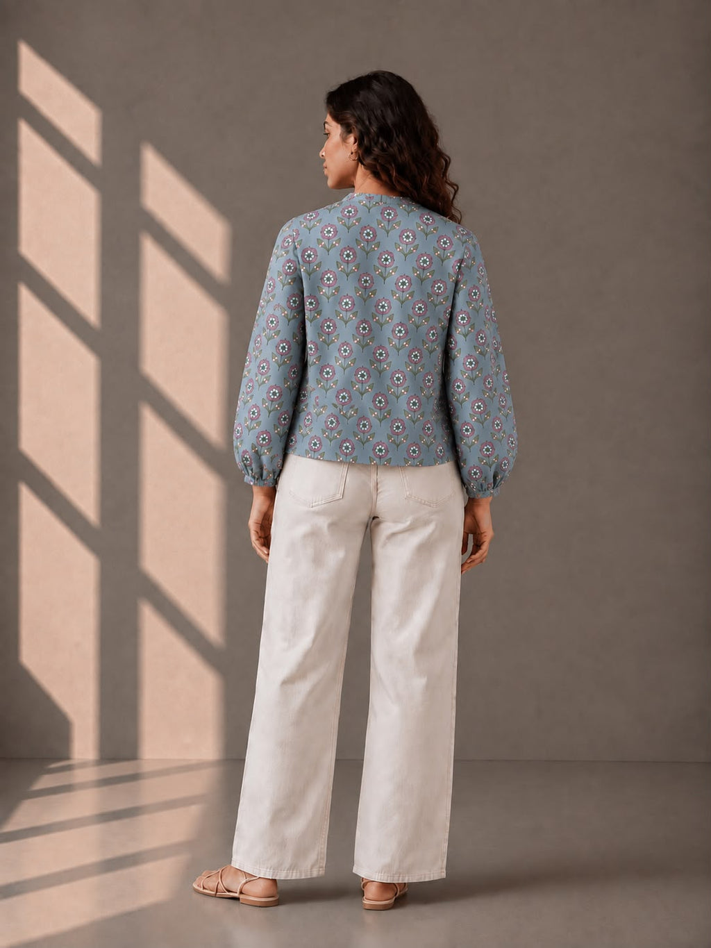 Casual floral top for women crafted in breathable cotton with gathered detailing.