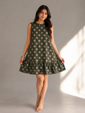 Front view of bottle green polka dot cotton sleeveless ruffle dress for women