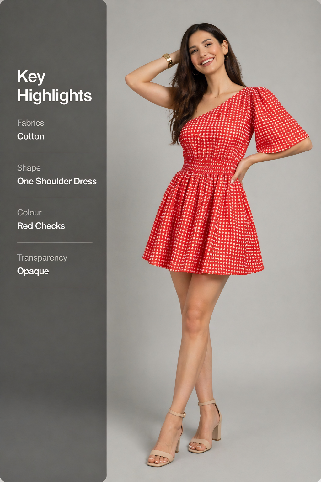 Woman wearing a red checkered one-shoulder dress on a gray background