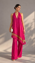 Fuchsia pink halter-neck top and palazzo set with golden embellishments