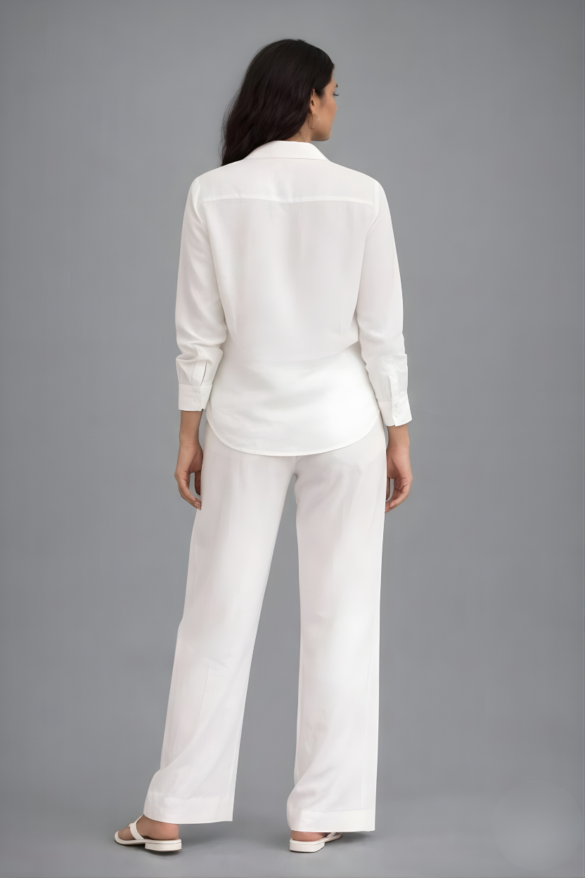 Relaxed fit white motif shirt styled for smart casual look