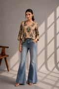 Front view of golden floral modal silk western top for women