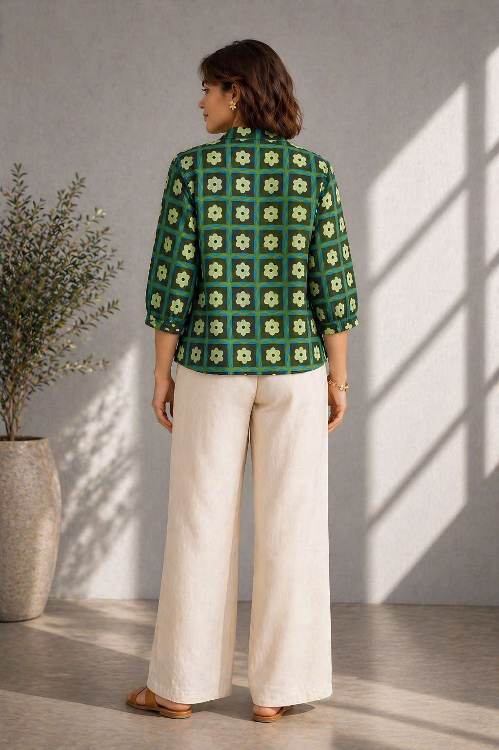 Floral print cotton blouse styled with wide-leg pants