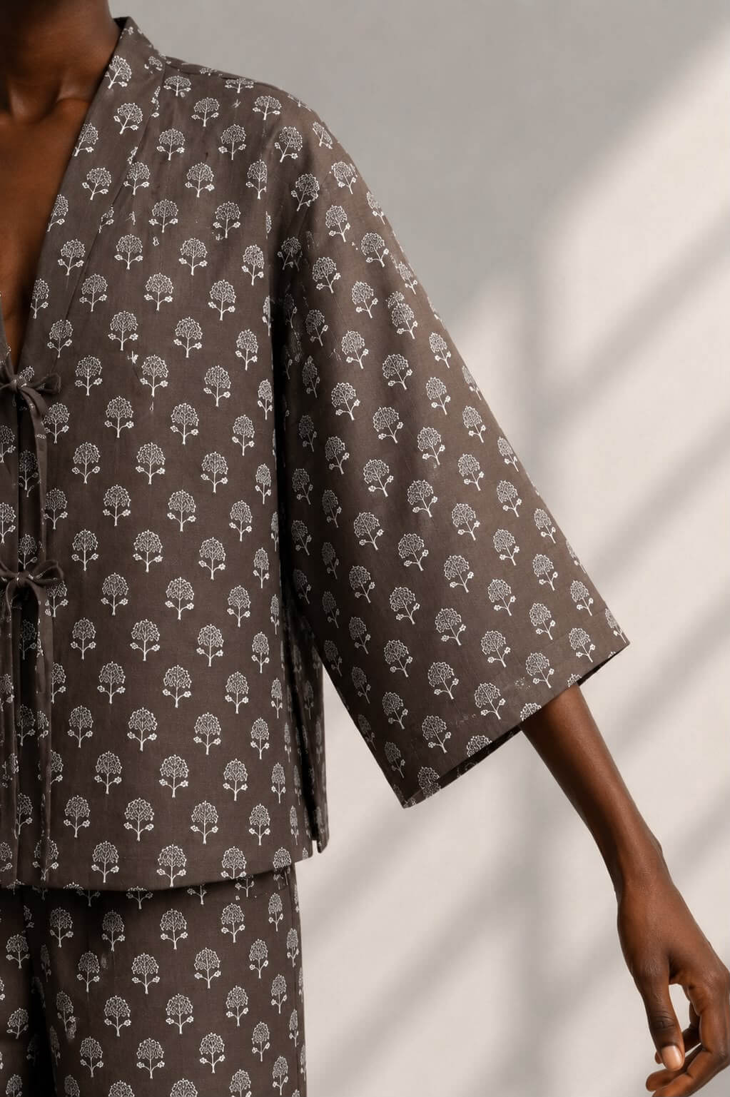 Women's brown cotton co-ord featuring floral block prints and a tie-front top.