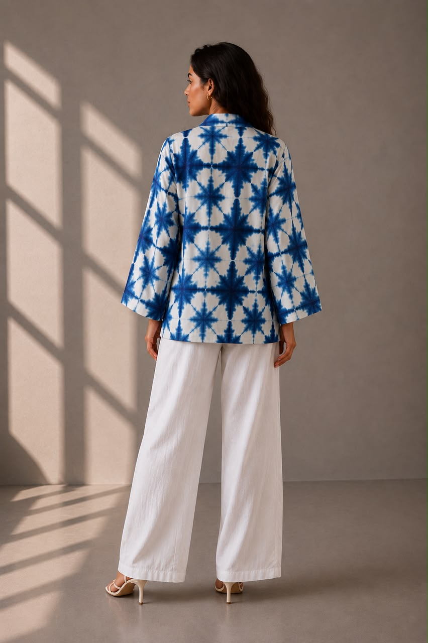 Women's summer resort top in indigo tie-dye print and breathable cotton fabric.