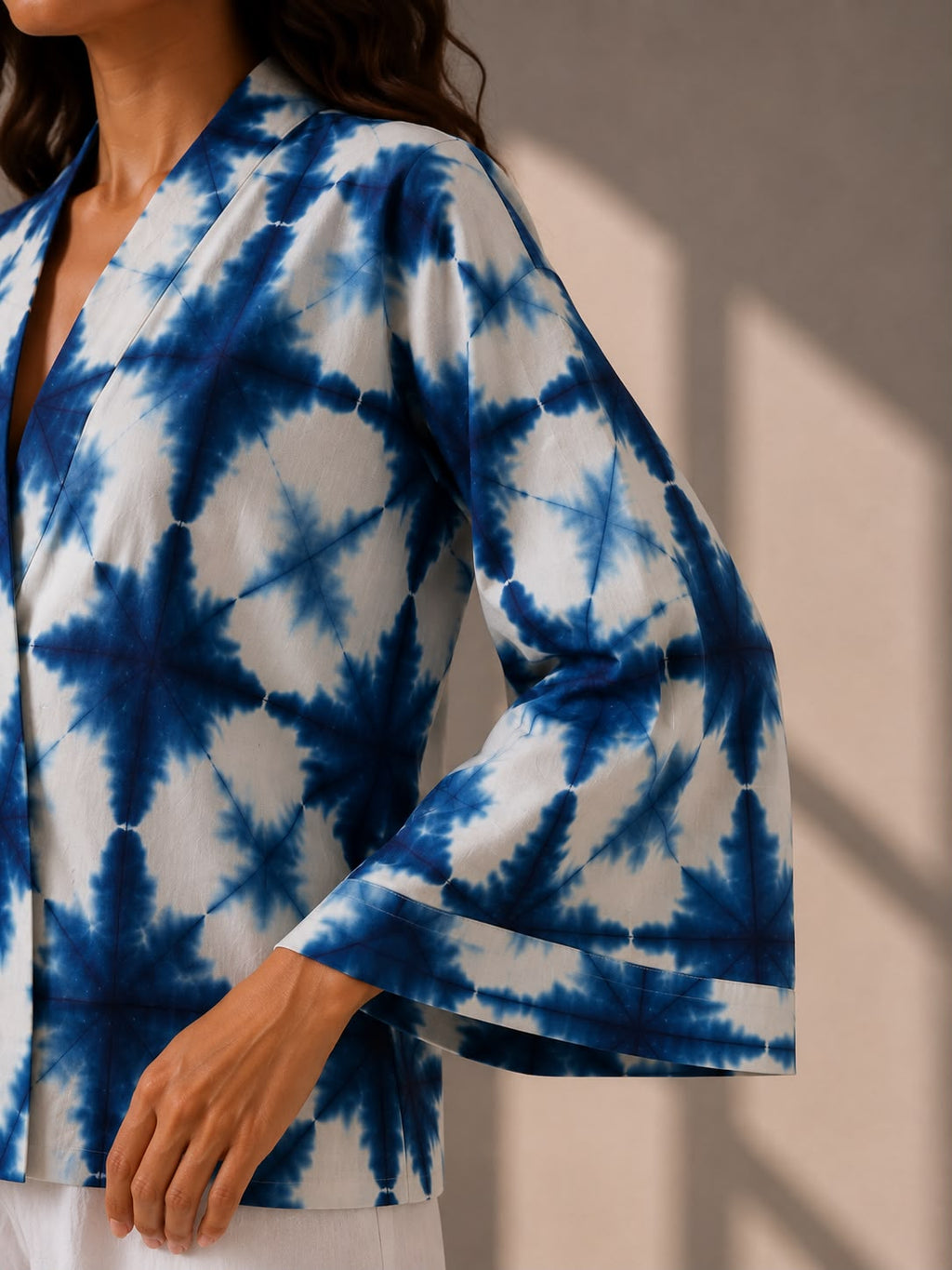 Handcrafted blue and ivory tie-dye cotton shirt with kimono sleeves.