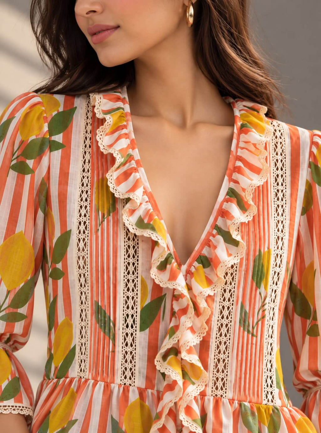 Lemon print top with lace and ruffle detailing