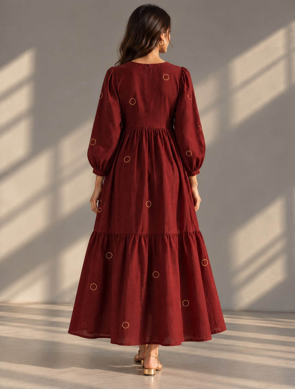 Maroon cotton dress with golden pearl embellishments