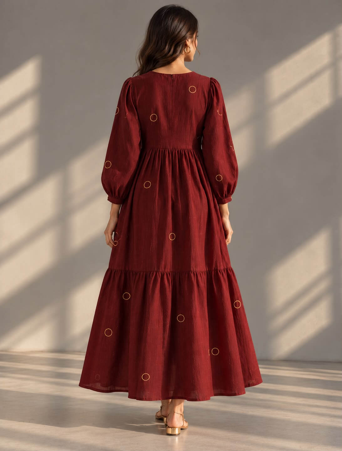 Maroon cotton dress with golden pearl embellishments