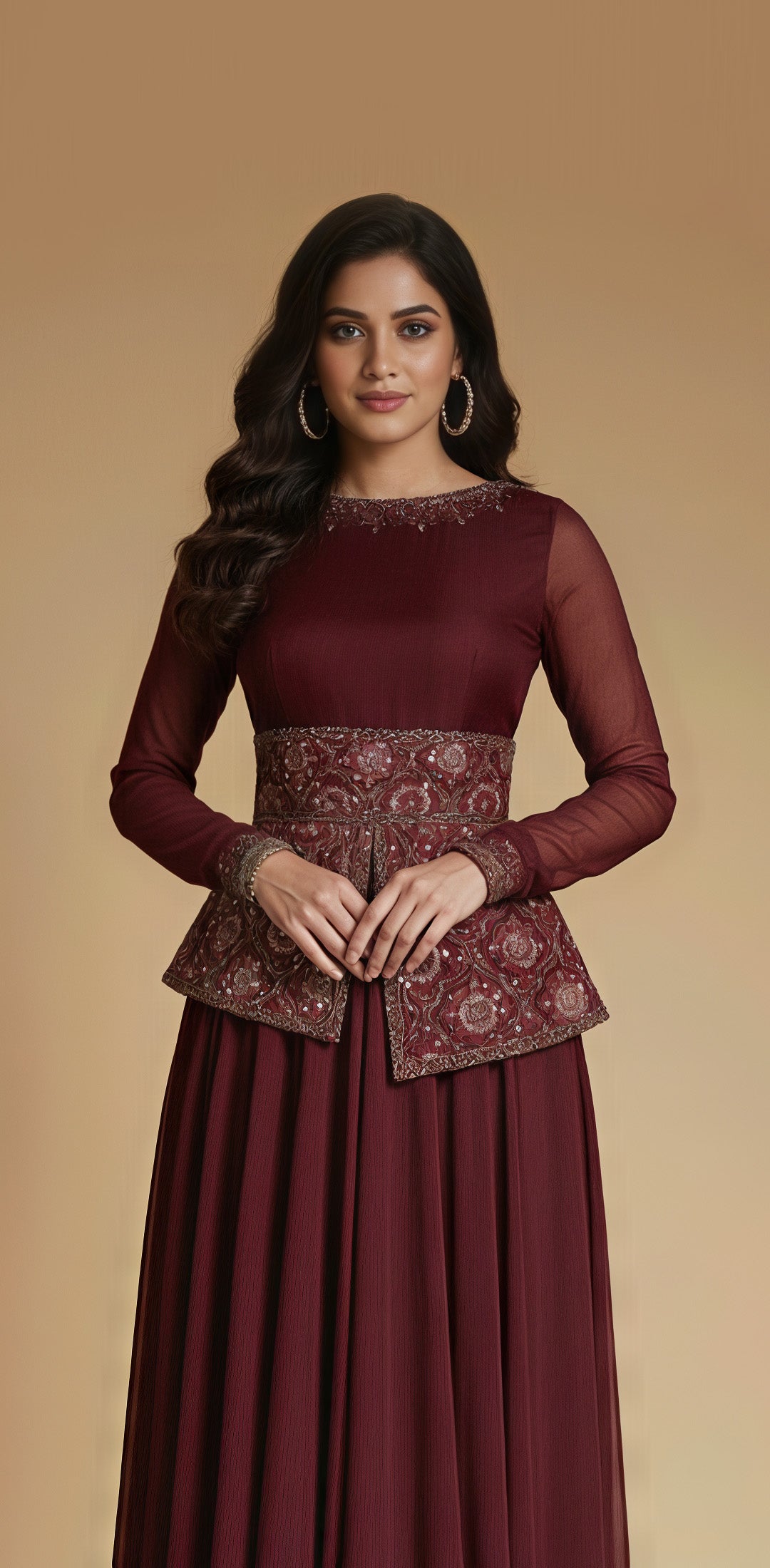 Woman wearing a maroon dress with a patterned waistband against a beige background