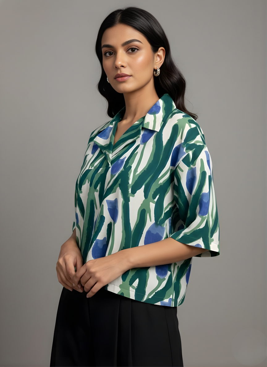 Green resort style cotton shirt for women with abstract floral print