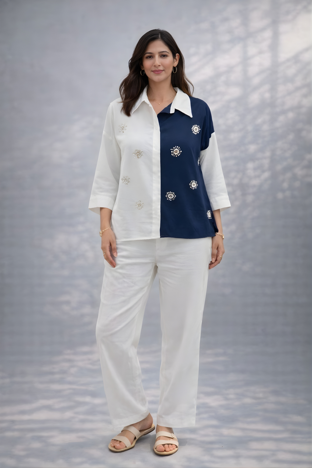 Dual-tone navy and ivory women’s shirt with floral embellishments