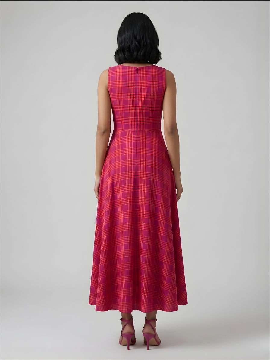 Full length view of pink checkered midi dress for women