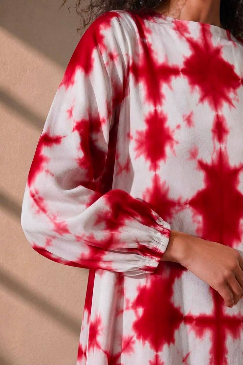 Breathable handcrafted cotton tie-dye dress for women with long sleeves and tiered detailing by Gehru Label.