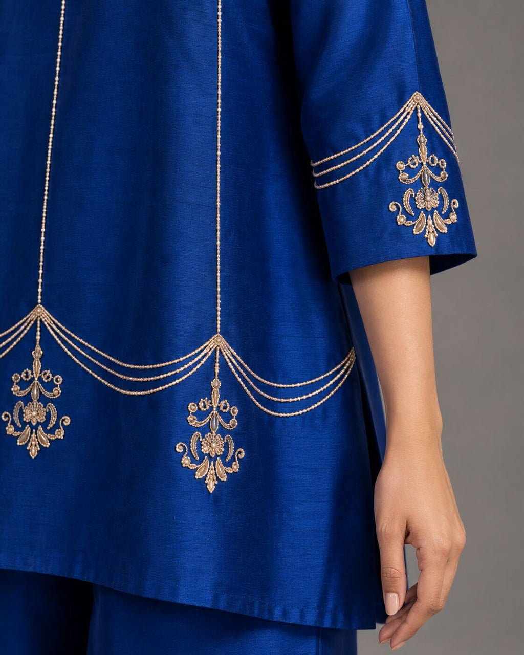 Intricate Zardosi embroidery detailing on royal blue co-ord set