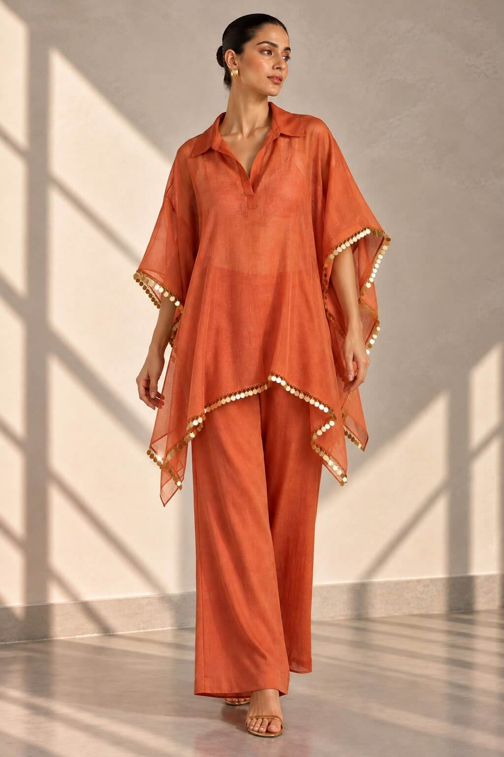 Rust orange Chanderi kaftan palazzo set with gold-toned embellished borders