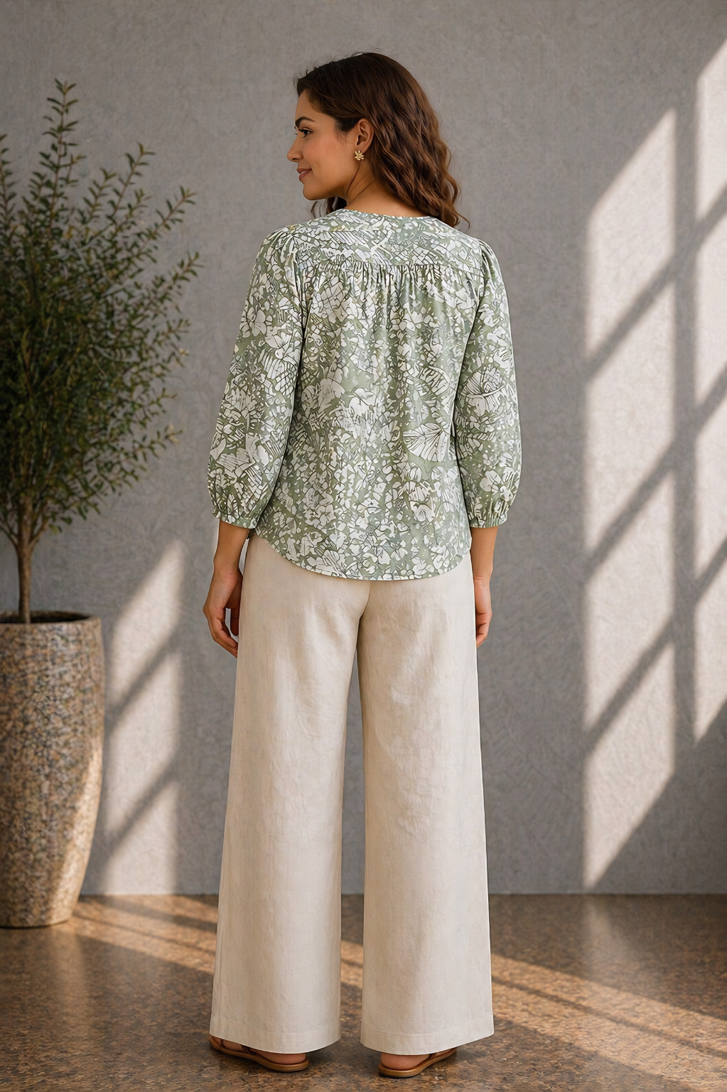 Sage green floral button-down top with puff sleeves for women