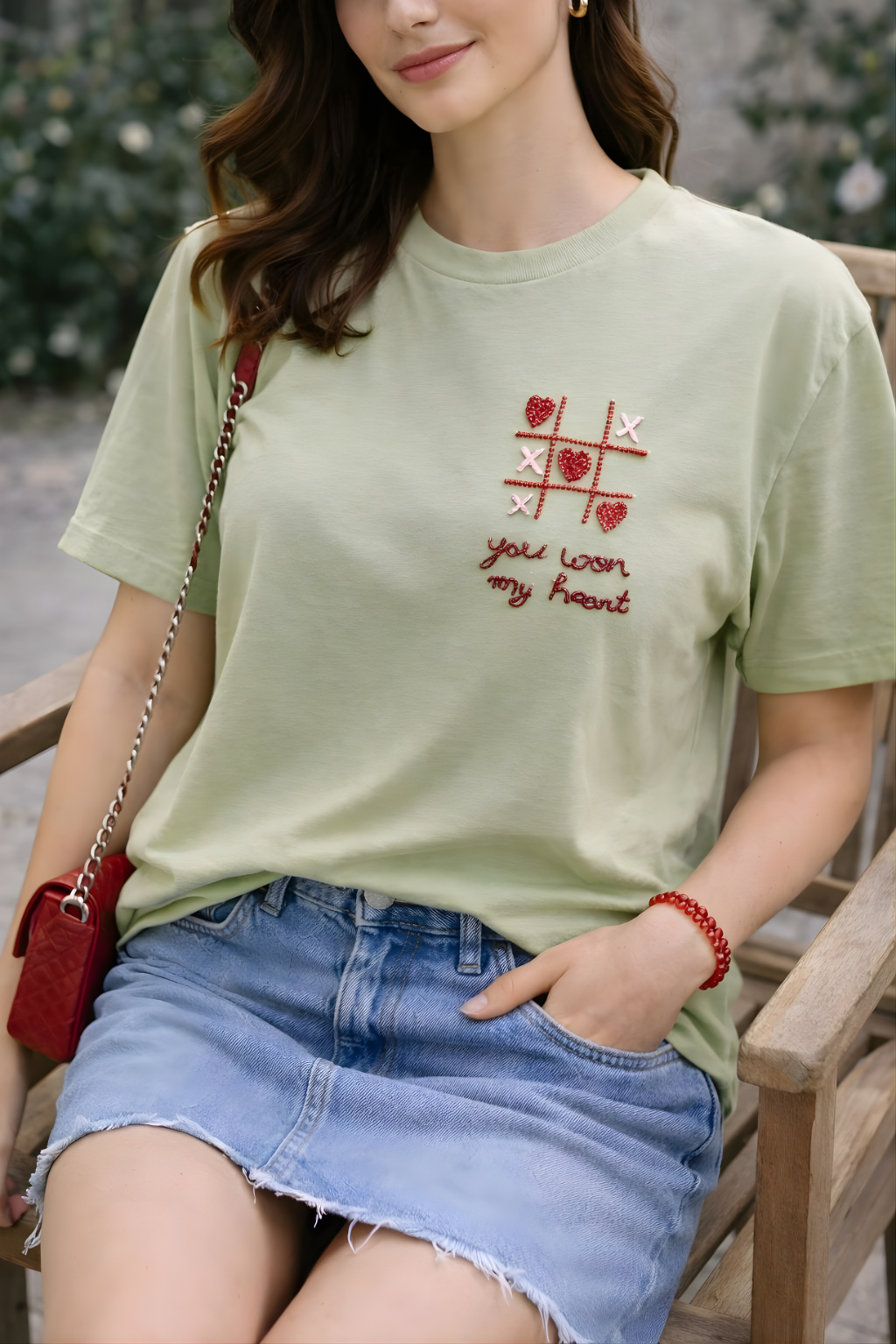 Casual sage green cotton T-shirt with romantic heart tic tac toe embellishment design.