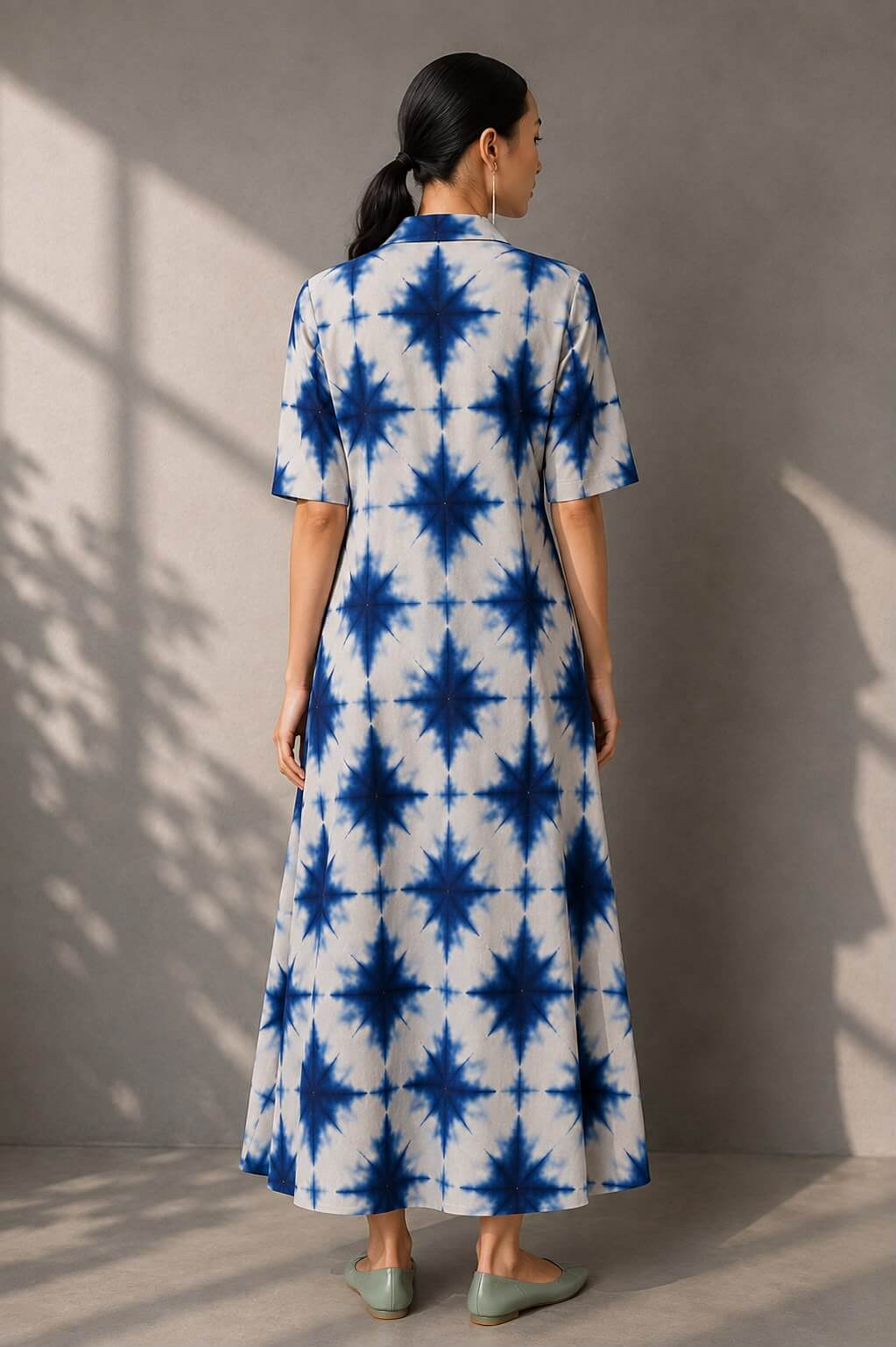 Indigo shibori inspired cotton dress featuring a relaxed silhouette.