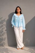 Women's sky blue cotton blouse featuring pintuck detailing and full sleeves.