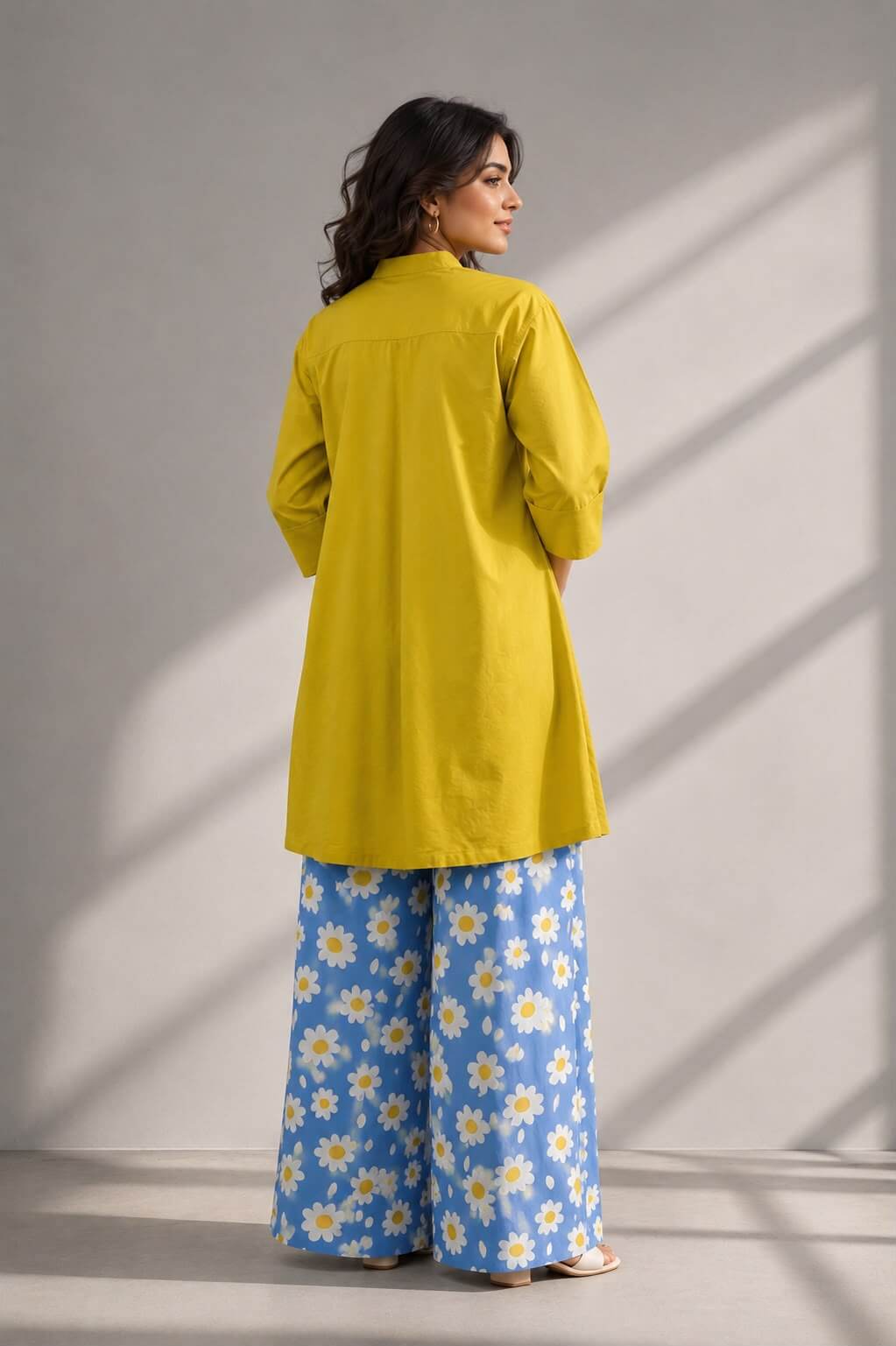 Back view of Sunflower Sky cotton co-ord set with relaxed mustard tunic and floral palazzo by Gehru Label.