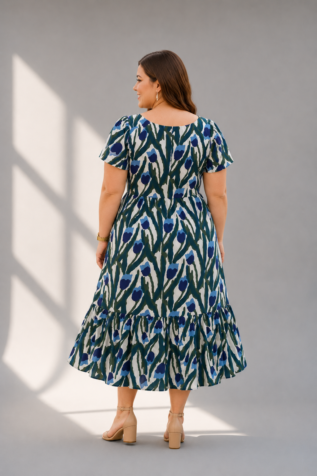 Back view of handcrafted tulip block print cotton tiered dress
