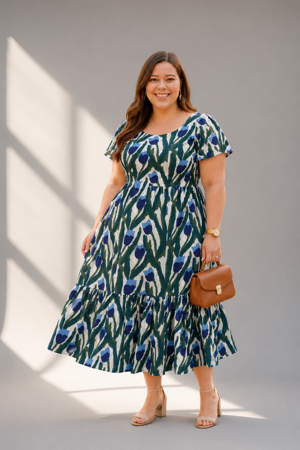 Front view of tulip block print cotton tiered midi dress for women