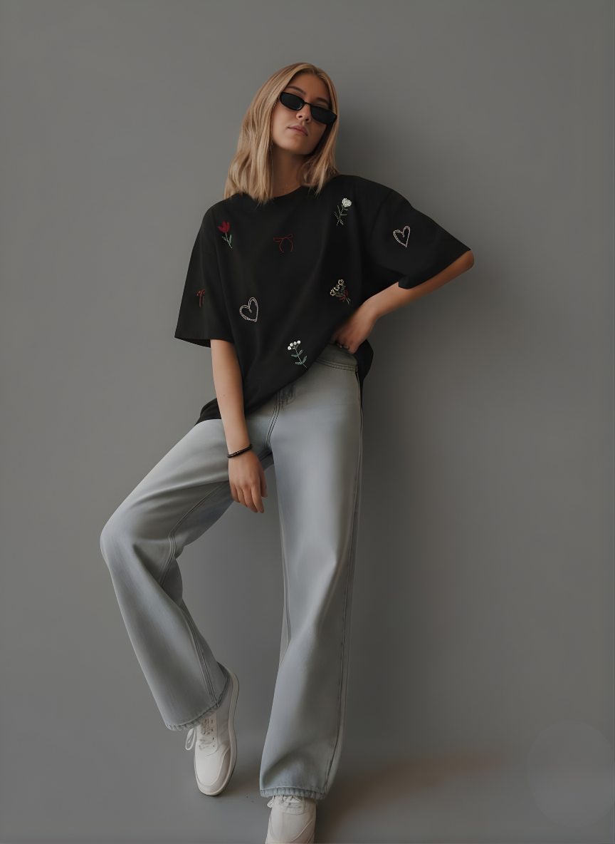 Women’s relaxed fit embroidered tee styled with trousers