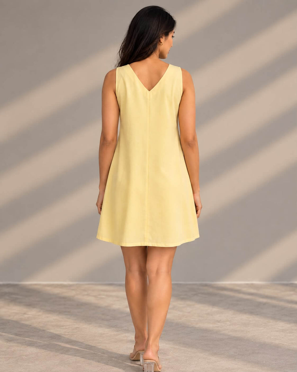 Yellow A-line birthday dress with floral embroidered hem
