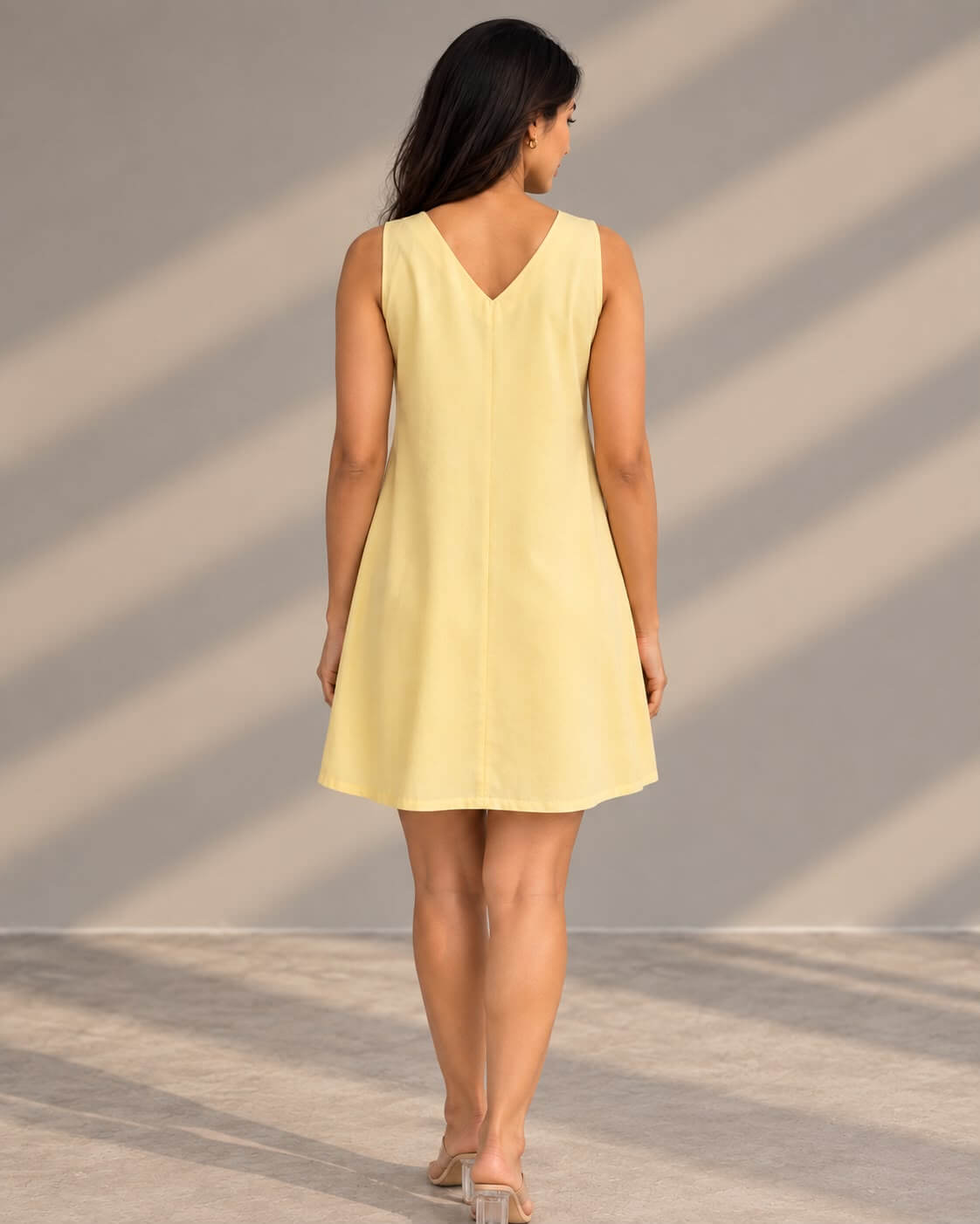 Yellow A-line birthday dress with floral embroidered hem